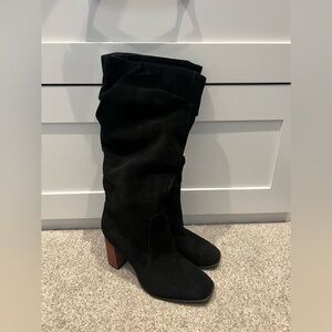 Black boots a little under the knee size 7.5